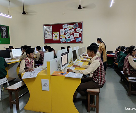 Students working on computers in the KVN College computer lab